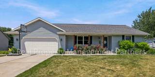 Updated 3-Bed Home with 2-Car Garage and Fenced in Yard on .23+ Acres, Near GVSU Gallery 1