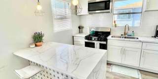 Fully Furnished 2BR Home with Huge Yard & Stunning Views – In-Unit Washer/Dryer! Gallery 1