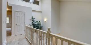 East Anchorage Condo with Fenced in Yard, W/D in unit, & 2 Car Garage! Close to JBER, Baxter Bog Park, and Baxter Elementary School. Gallery 1