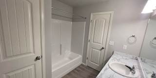 Townhome w/ 2 car garage, A/C-Newer, Low Maintance, & Conviniently Located Gallery 16