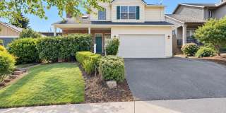 Beautiful 4-Bedroom Home with Spacious Living Areas, Fenced Yard & 2-Car Garage Gallery 1