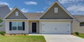 Welcome to 807 Red Berry Lane, a charming and modern rental home that combines luxury and comfort in every detail. Gallery 1