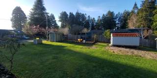 Spacious 1 bedroom with deck, wooded view  garden area. Most utilities included. Gallery 1