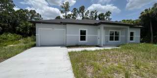 NEW CONSTRUCTION- Modern 3 Bed / 2 Bath Home in E Lehigh Acres Gallery 1