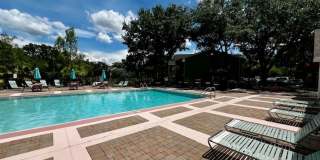 MOVE IN NOW!! Gated community Miriada! 1st floor 1X1.5 bath condo near pool area!!! Laminate wood flooring in living area and carpet in bedroom! Has washer & dryer! Gas stove & water heater! Gallery 34