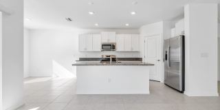 Newer fully fenced backyard 4 Bds/2.5 Bths Home with great floor plan and Resort community Gallery 8
