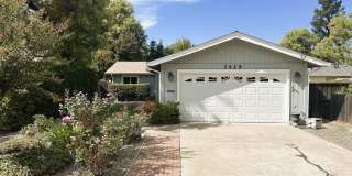 Bright & Spacious 3-Bedroom Home with Large Lot, Attached Garage & In-Unit Laundry Gallery 1