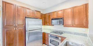 Bright 2BD/2BA Condo in Sabre Springs with Covered Balcony, In-Unit Laundry & Garage Gallery 1