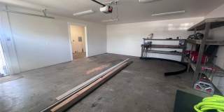 2 Bedroom 1 bath house with extra large double car garage and extra storage space! Gallery 26