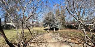 Bi-Level House w/ Massive Backyard, Storage, & Character! Gallery 24