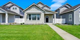 Brand New, Stylish 4-Bedroom Home with Vaulted Ceilings and Private Patio Gallery 1