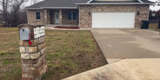 3 Bedroom 2 full bath home with oversized 2 car garage new vinyl flooring and community pool access Gallery 1