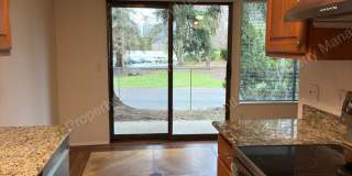 Kirkland Gem! Ground-Floor 1-Bedroom Condo w/2 Parking Spots & Beautiful Fireplace! Gallery 1