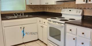 Beautiful 2/2/1 1150 Sq. Ft. with BONUS ROOM!!... tile & luxury plank flooring, Frest paint and a large fenced in yard! Gallery 7