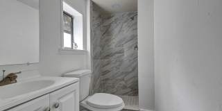 Bright & Updated 2BR Bottom Unit Duplex | White Kitchen & Stainless Appliances in Saint Petersburg Gallery 14