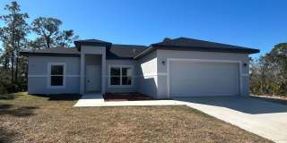 SPACIOUS 4 BEDROOM- 2 BATHROOM RETREAT IN BEAUTIFUL LAKE PLACID Gallery 1