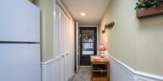 **Light-Filled Condo with Designer Finishes ✨ | Screened Porch Gallery 5