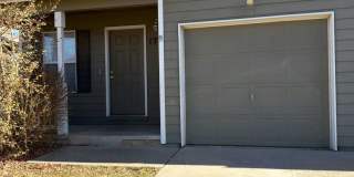 Look and Lease Special $200 off your first month’s rent! Adorable 2 bedroom townhome with garage! Gallery 1