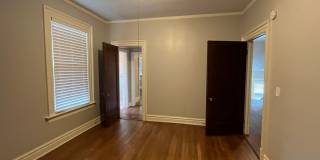 Central Gardens home with 4BR/2ba up w office/flex space. Wrap around, covered front porch! Pets are owners approval. Gallery 16