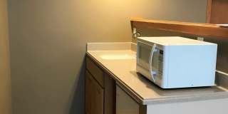 Fenced-in Yard + West Side of Manhattan + Washer & Dryer Included + 2-Car Garage! Available July 3rd! Gallery 14