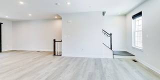 Welcome to this beautifully designed 3 level townhome in Westphalia Town Center Community! Gallery 8