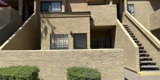 ELLIOT PLACE CONDOMINIUMS UPDATED/REMODELED GROUND FLOOR 1 BED PLUS DEN UNIT WITH 1 CAR GARAGE Gallery 1