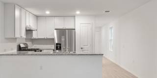 This beautiful single-story home has 4 bedrooms, 2 baths, vinyl flooring throughout, an open floor plan Gallery 8