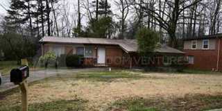 Charming 3BR/2BA Brick Home with Fenced Yard Gallery 1