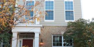 COMING SOON - End Unit Luxury  3Bed + 2 full/2 Half TH! Two Car Garage parking Gallery 1