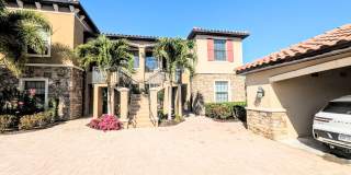 Seasonal/short term turnkey furnished Incredible 2/2 with den ground floor condo in resort Esplanade Lakewood Ranch Gallery 1