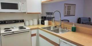 Bird Bay Village Annual Rental – Furnished 1st Floor Unit with Covered Parking Gallery 28