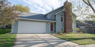 3-Bedroom NE Rochester home with Sunroom, Fenced Backyard & Attached Garage Gallery 1