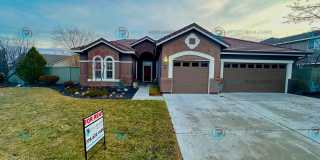 Open Kitchen, Expansive Living, and Covered Patio in Tranquil South Reno Near Trails, Parks & Shopping Gallery 1