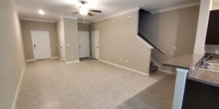 Inviting 2 Bedroom Townhome | Ideal Location & Functional Layout Gallery 3