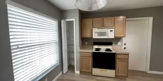 Welcome Home! Updated flooring & fresh interior paint! Move in OCTOBER! Beautiful 3X2 with attached 2 car garage! Lawn care included! Near E50!! Gallery 8