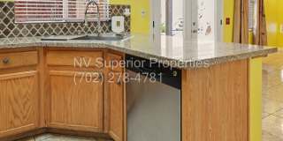 NW!! 4 Bedrooms!!! All Tile and Pergo flooring T/O!! NO Carpet!!! Low Maintenance Desert landscaping front and back!! With Patio cover in back!!! Gallery 24