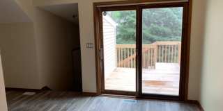 2 BR, 1.5 BA Clive split level duplex.  Deck and one car attached garage. Gallery 8