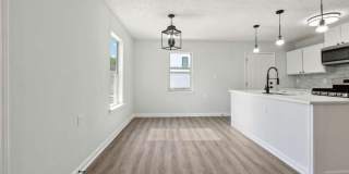 Fully renovated, 3 bed, 1 full bath, new LVP, new paint, granite counters, open floor plan, W/D hookups, must see! Gallery 4