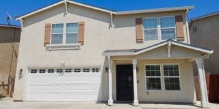 Spacious 4-Bedroom Home with Solar, Finished Garage, Large Pantry & Low-Maintenance Backyard in Merced Gallery 1