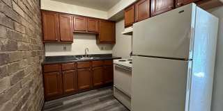 Amazing 1BR in Desirable Plum Area! Beautiful Exposed Brick and Air Conditioning! Call Today! Gallery 1