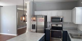 Rare home on the island! Large fenced in back yard! Pets are allowed. Owner will manage. Gallery 7