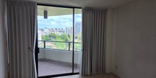 Rarely available 1-bedroom, 1-bathroom luxury apartment in the Punahou Cliffs Condominium. Gallery 8