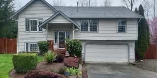 4 bedroom 2.75 bath, Huge Fenced Yard with Landscaping Included!! Gallery 1