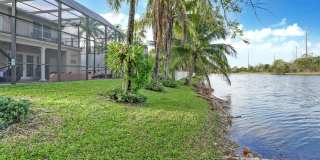Beautiful Canal-Front 4BR Home with Pool & 3-Car Garage Gallery 9