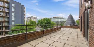 Stunning 1,000 Square Foot Washington Circle Apartment W/Garage Parking, Private Terrace, & Storage Gallery 1