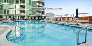 Modern Corner Unit 1BR Condo in Midtown with Skyline Views Gallery 23
