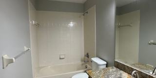 Beautiful Townhome in a gated community with assigned parking spots and a community pool Gallery 16