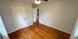 AVAILABLE NOW! Spacious 4 BR, 2 Bath House! Wood Floors, Attached Garage, W/D Included Gallery 13