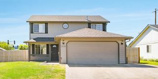$500 move-in special! Spacious 4-bdrm/2.5-bath Hillsboro home. Fenced yard w/ covered deck, 2-car garage, great location Gallery 3