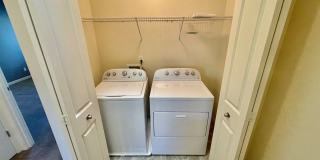 Cedar Hills/Mills Area Two Bedroom Townhome with 2 Car Garage, A/C & Private Deck. Gallery 25